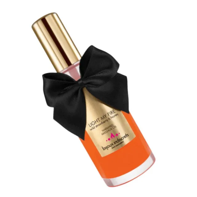 Ulei de masaj BIJOUX INDISCRETS Light My Fire Wild Strawberry. cu efect de încălzire. aromă de căpșuni și miere. 100 ml